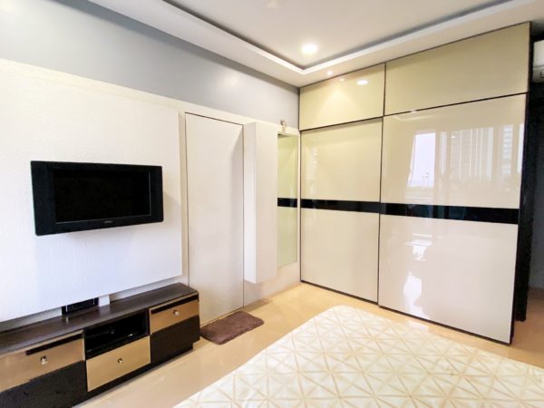 sliding wardrobe with backpainted glass finish